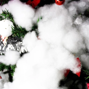 Artificial white snow cotton fluff for Christmas tree decoration and festive window displays