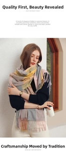 Detail of soft winter scarf with pastel color-block patterns and decorative tassels