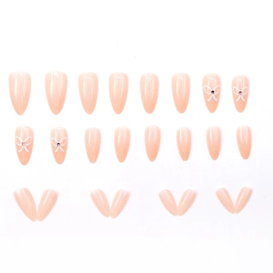Faux ongles amande roses avec des nœuds blancs et des strass violets élégants