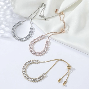 Detailed view of adjustable slider bracelets with sparkling zircon stones in three colors