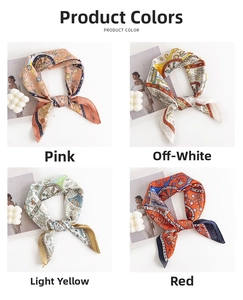 Close-up of floral silk square scarves in pink, cream, and yellow with vintage patterns
