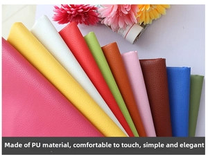 Detailed view of ten colorful lychee-textured PU leather samples for passport covers