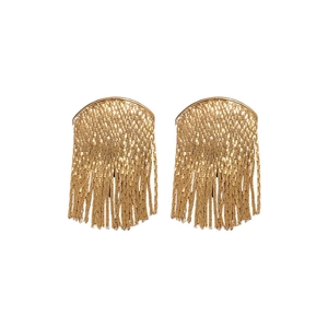 Elegant gold fringe earrings with woven texture and long metallic tassels on white backdrop
