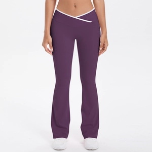 High waist purple flared yoga pants with crossover waistband and white contrast piping