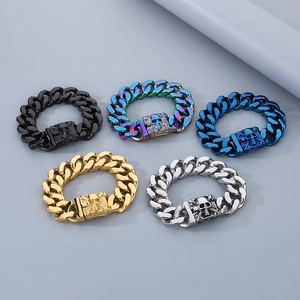Detailed view of five colorful Cuban chain bracelets with skull clasps in a row