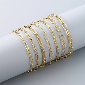 Detailed view of various golden titanium steel anklets with elegant square link chains