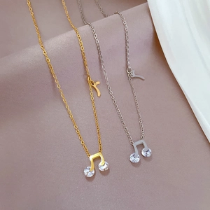 Minimalist titanium steel musical note necklaces with zircons in gold and silver finish