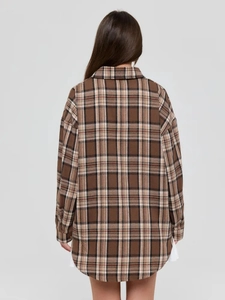 Women's oversized plaid flannel shirt jacket with vintage brown and black checkered pattern