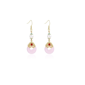 Detail of Chinese style earrings with gold hooks, pearls and pink jade safety buckles