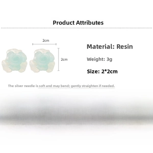 Detail view of 2x2cm light blue resin flower stud earrings with silver needles