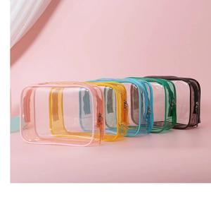 Transparent PVC makeup bags with five colored zippers showing large storage capacity