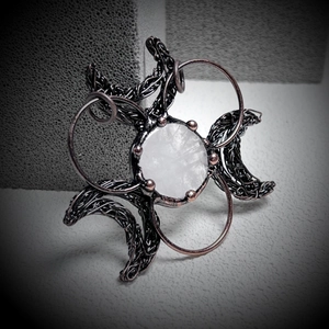 Biohazard symbol natural white quartz pendant with vintage bronze wire wrapped design