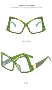 Detail view of green leopard butterfly frames with gold hinges and clear lenses