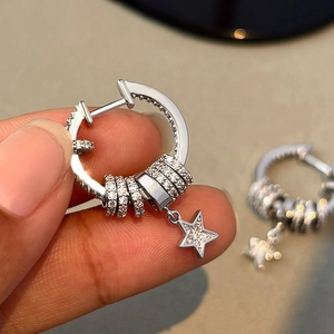 Silver star drop hoop earrings with sparkling zircon tassels for a minimalist chic look