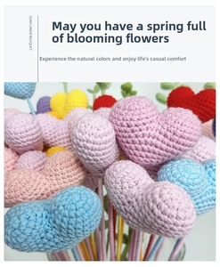 Close-up of colorful handmade crochet heart bouquet with intricate knitted texture