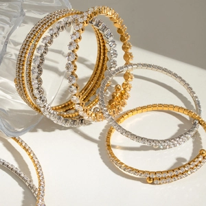 Elegant stainless steel bangles with sparkling zircon crystals in gold and silver plating