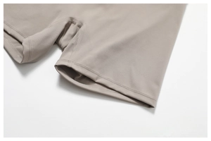 Detail of high-waist yoga shorts featuring reinforced crotch and professional flatlock seams