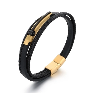 Multilayer braided leather bracelet for men with golden magnetic steel clasp on white background