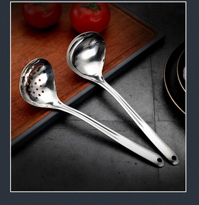 Polished 304 stainless steel heart-shaped soup ladle and skimmer set on wooden board