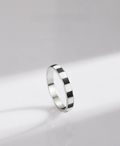 Detailed view of S925 sterling silver ring with classic black and white enamel checkerboard