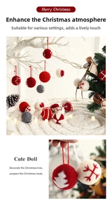 Close-up of wool felt Christmas ball ornaments featuring star and tree patterns with hanging loops