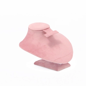 Pink velvet mannequin bust for necklace display and jewelry presentation on white background