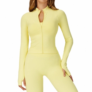 Light yellow seamless stand collar yoga jacket and leggings set with thumb holes