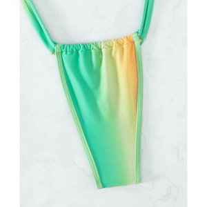 Detailed close-up of gradient bikini bottom showing premium stitching on elastic fabric