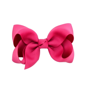 Hot pink grosgrain ribbon hair bow clip for girls with a stylish large alligator clamp