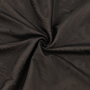 Close-up of fine black mesh fabric with a semi-transparent texture and spiral pattern