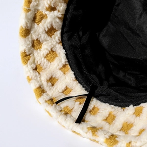 Plaid plush bucket hat in yellow and white checkers with warm winter lining