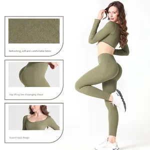 Set yoga verde oliva senza cuciture con crop top a maniche lunghe e leggings a vita alta