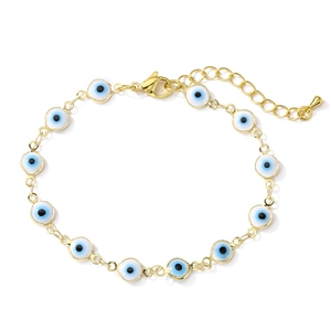 Close-up of gold-plated evil eye bracelet with lobster clasp and adjustable extension chain