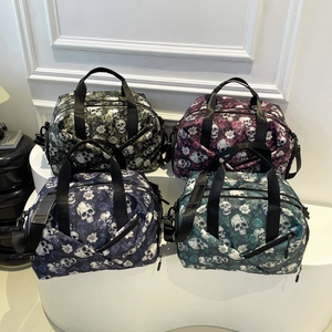 Large capacity travel duffel bags with skull and rose print in four different colors