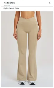 Détail du pantalon de yoga évasé à taille haute avec ceinture croisée et poche latérale