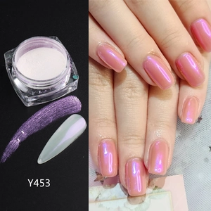 Macro view of aurora nail powder Y453 with pink purple pearlescent shimmer effect