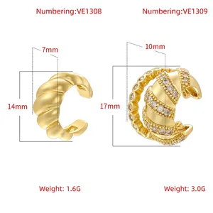 Ear cuff vintage in rame dorato con trama a tortiglione e dettagli in zircone