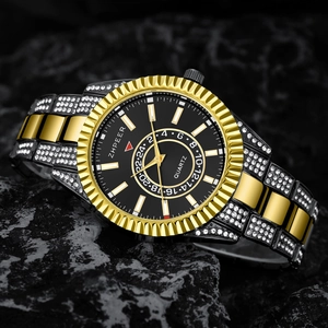Macro view of ZHPEER quartz watch with gold-black steel strap and diamond bezel on rock