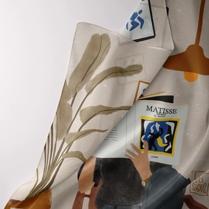 Close-up of bohemian tapestry with Matisse-inspired print and smooth silk texture