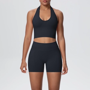 Detail of seamless knitted racerback sports bra and high waist shorts workout set
