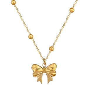 Elegant gold bow pendant necklace with beaded titanium steel chain on white background