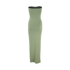 Detailed close-up showing the smooth texture and ruched design of this light green tube dress