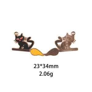 Detail view of Halloween black cat on broom charm with 23x34mm dimensions and metal texture