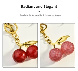 Detail view of cherry shaped keychains with glitter filling in red and pink colors