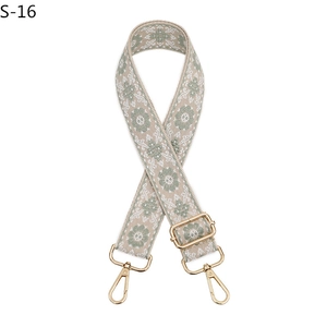 Ethnic style beige and green patterned canvas bag strap with gold metal hooks and S-16 label