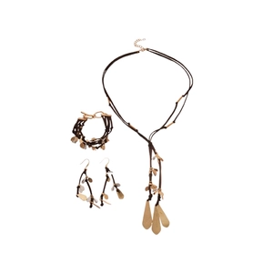 Golden leaf pendant jewelry set including necklace bracelet and earrings on white background