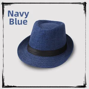 Detail of navy blue breathable straw fedora featuring a classic black decorative ribbon