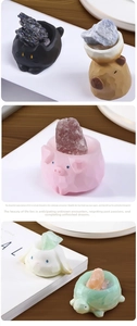 Close-up of cute animal crystal stone diffusers with natural raw minerals and resin bases
