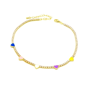 Detailed close-up of golden tennis chain with colorful enamel heart charms and crystals