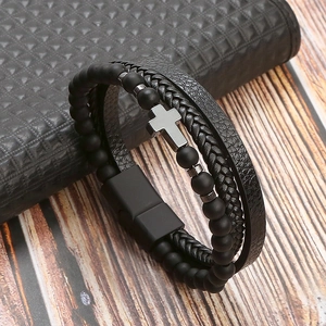 Men's multilayer bracelet with black stone beads, cross charm, and magnetic clasp